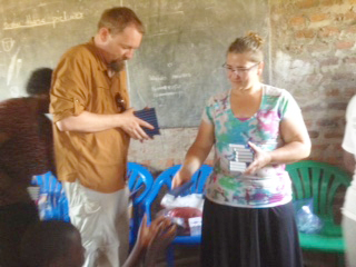 Transformation Team passing out Bibles